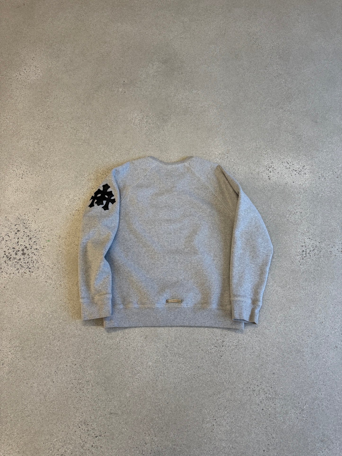 Chrome Hearts Paper Jam crewneck, back view showing layered triple cross print on heather gray