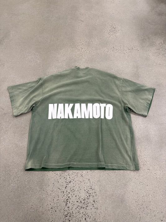 Satoshi Nakamoto green oversized impact logo tee back with bold white NAKAMOTO block lettering