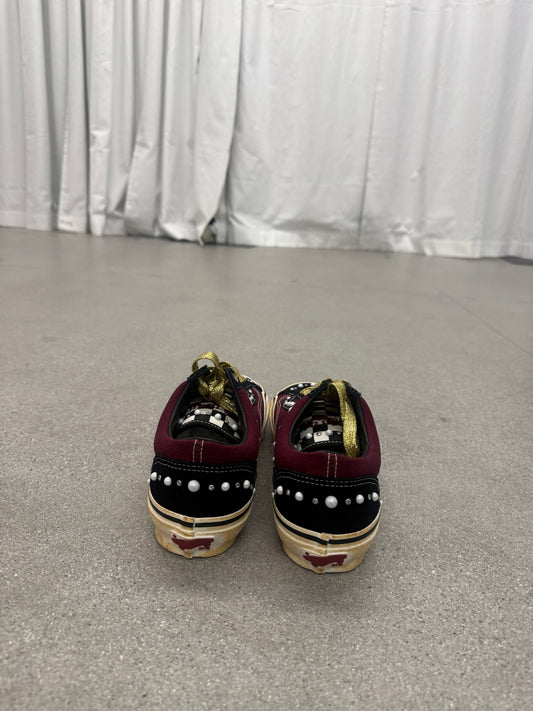 Top view of Satoshi Nakamoto Friends and Family Vans Old Skool laced up on pearlized burgundy leather upper.