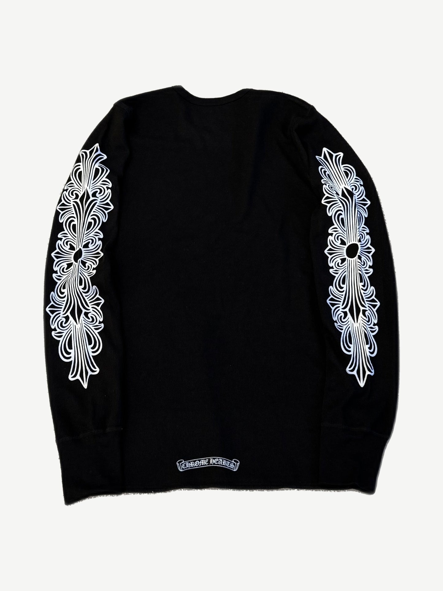Chrome Hearts black thermal longsleeve back, waffle-knit body with floral cross sleeve graphics and hem logo.