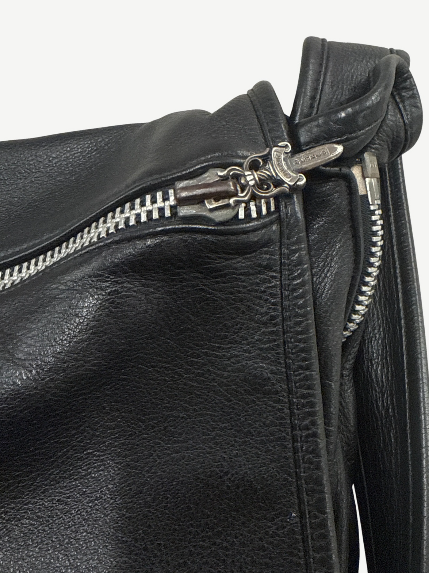 Chrome Hearts black leather Gunslinger messenger bag side view showing adjustable strap and hardware