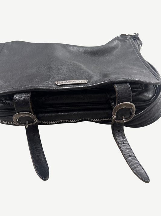 Chrome Hearts black leather Gunslinger messenger bag interior view with cross-stamped lining