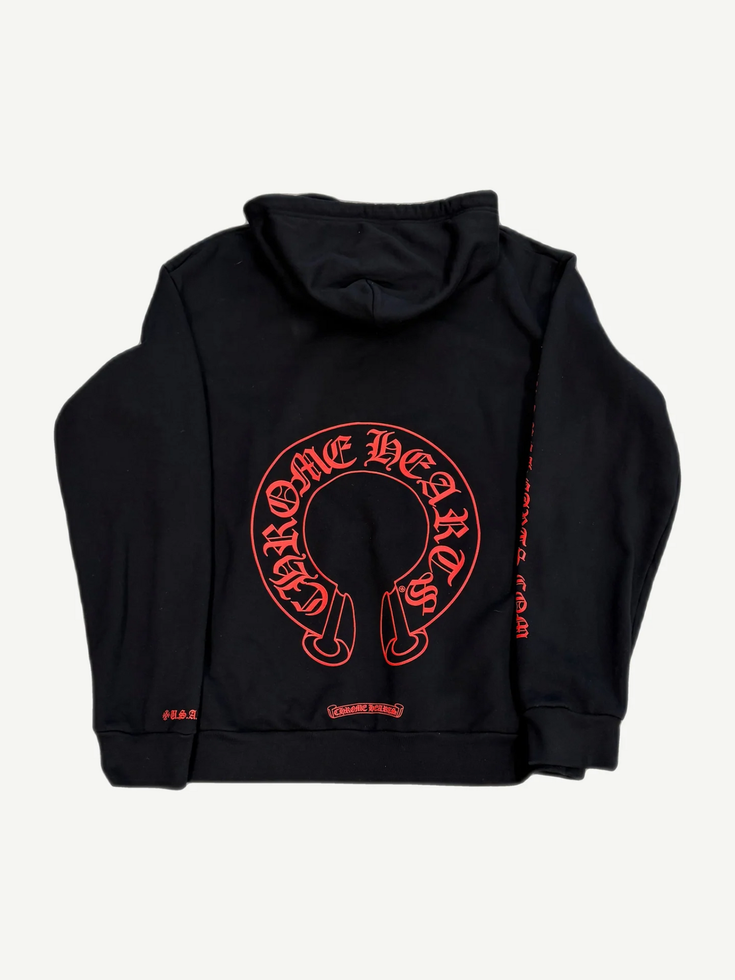Chrome Hearts black hoodie back with large red gothic Chrome Hearts horseshoe outline print across the shoulders.