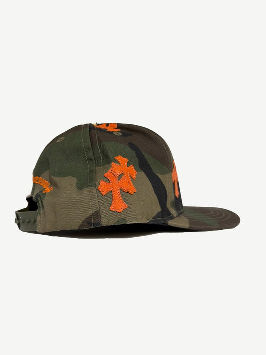 Chrome Hearts camo baseball cap side view with orange leather cross side panel patches