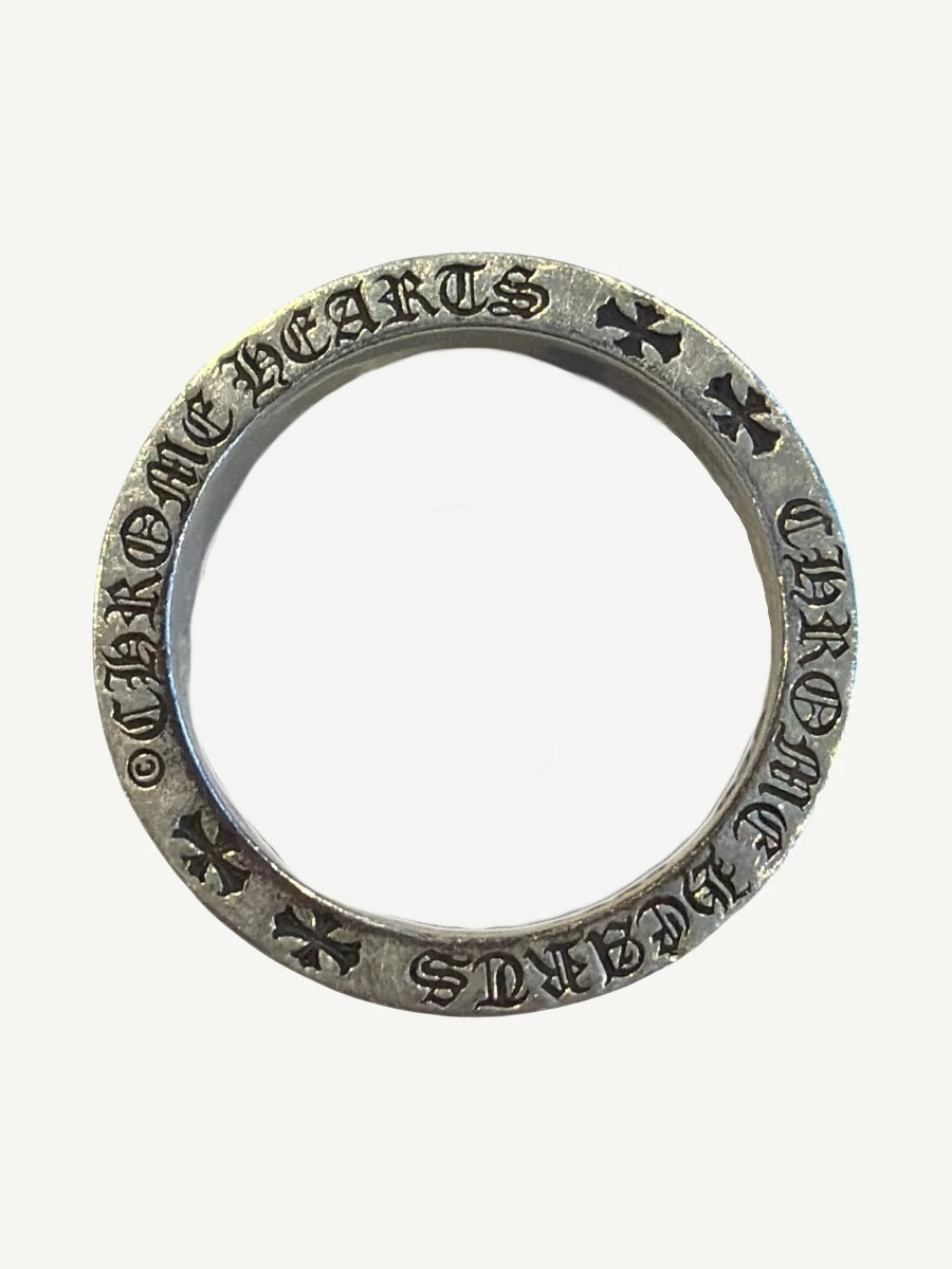 Chrome Hearts CH Forever ring top-down view through band showing gothic Chrome Hearts engraving and crosses