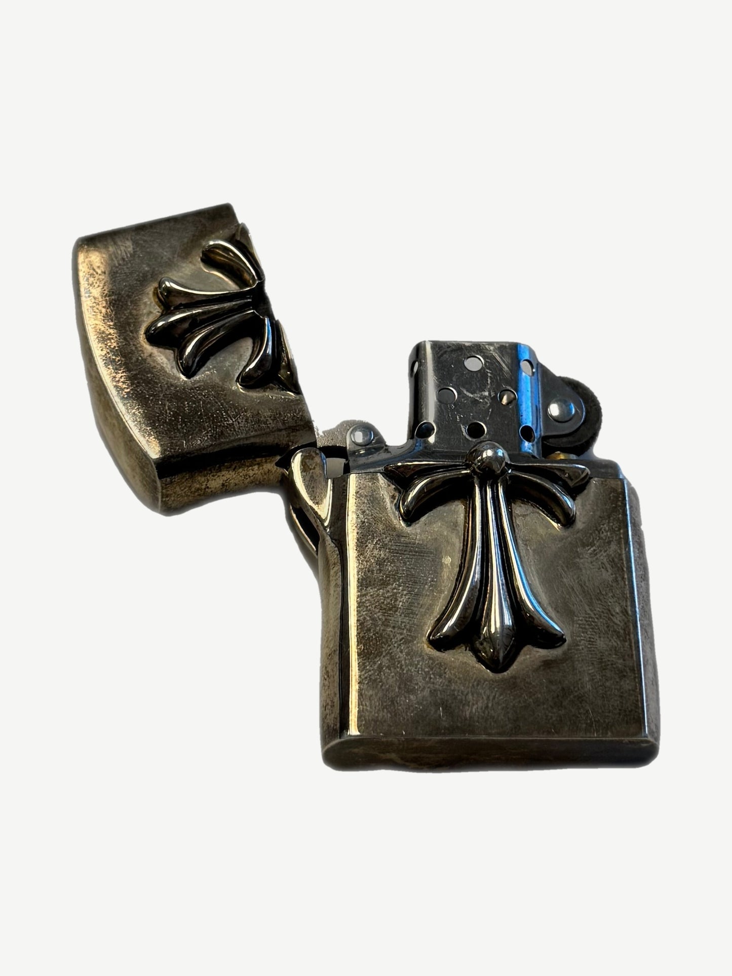 Chrome Hearts Zippo lighter open showing dual cross emblems on lid and case with brushed sterling insert