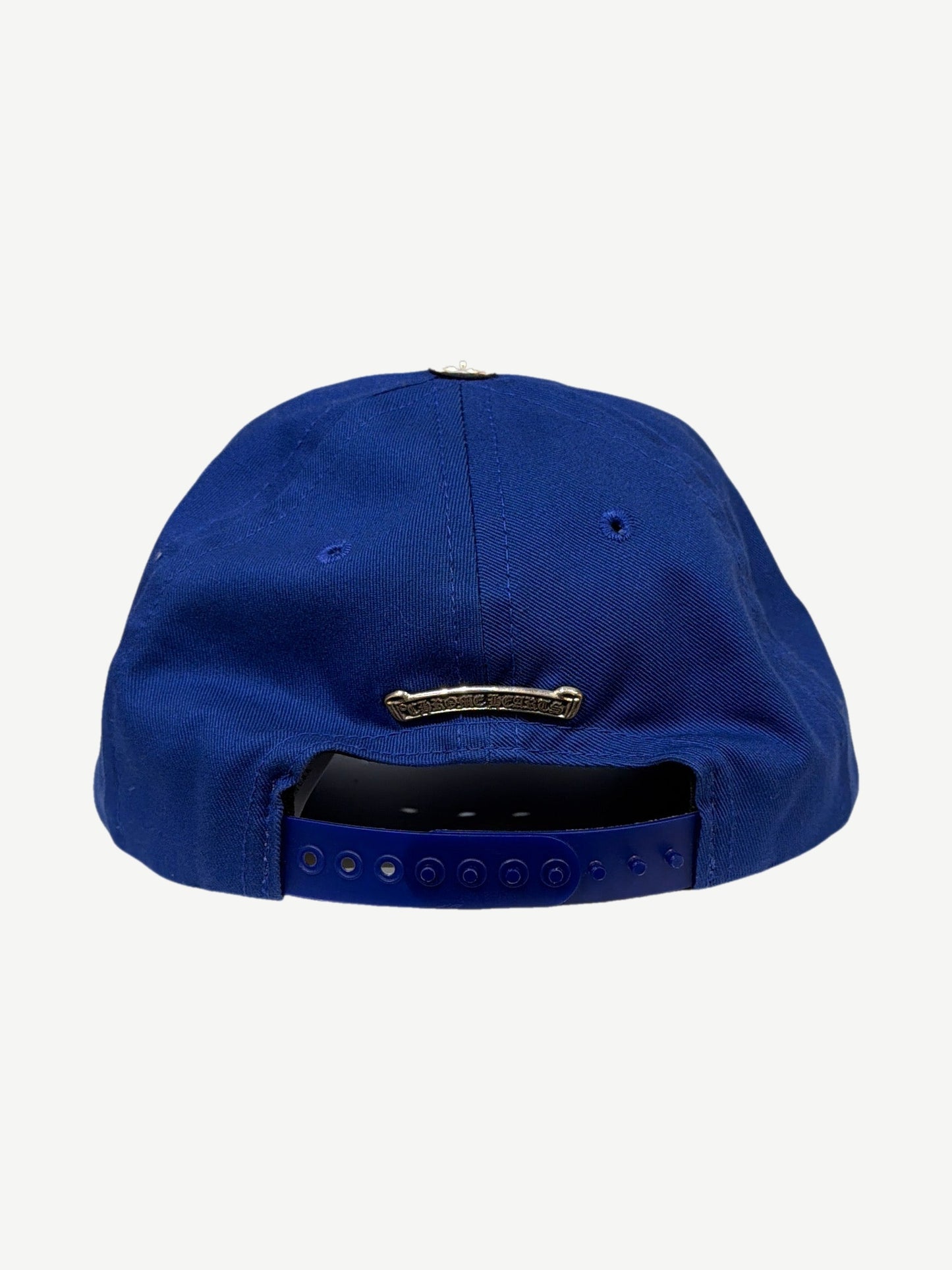 Chrome Hearts Matty Boy blue Space hat back, silver CH dagger plate closure on royal blue 5-panel crown.