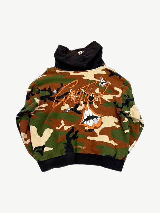 Chrome Hearts Matty Boy camo Caution zipup back view with orange Caution script and fanged mouth print