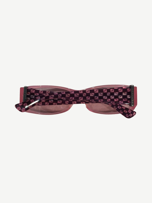 Chrome Hearts Matty Boy Ulein sunglasses top view showing pink and black checkerboard temple arms.