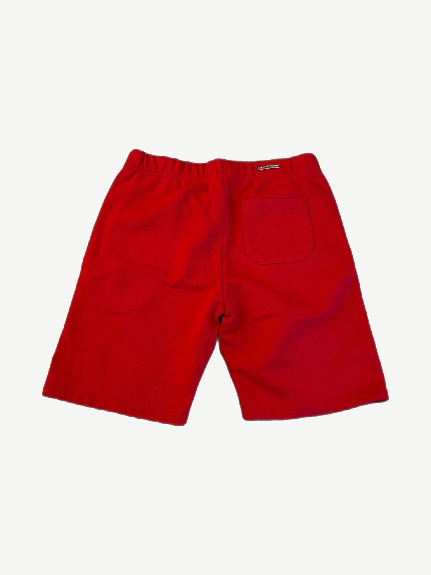 Chrome Hearts Hollywood sweat shorts back view in red showing back patch pocket and elastic waist.