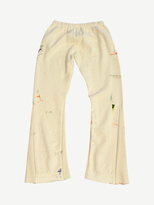 Gallery Dept painted flare sweatpants back view in cream cotton with paint splatter details and flared legs.