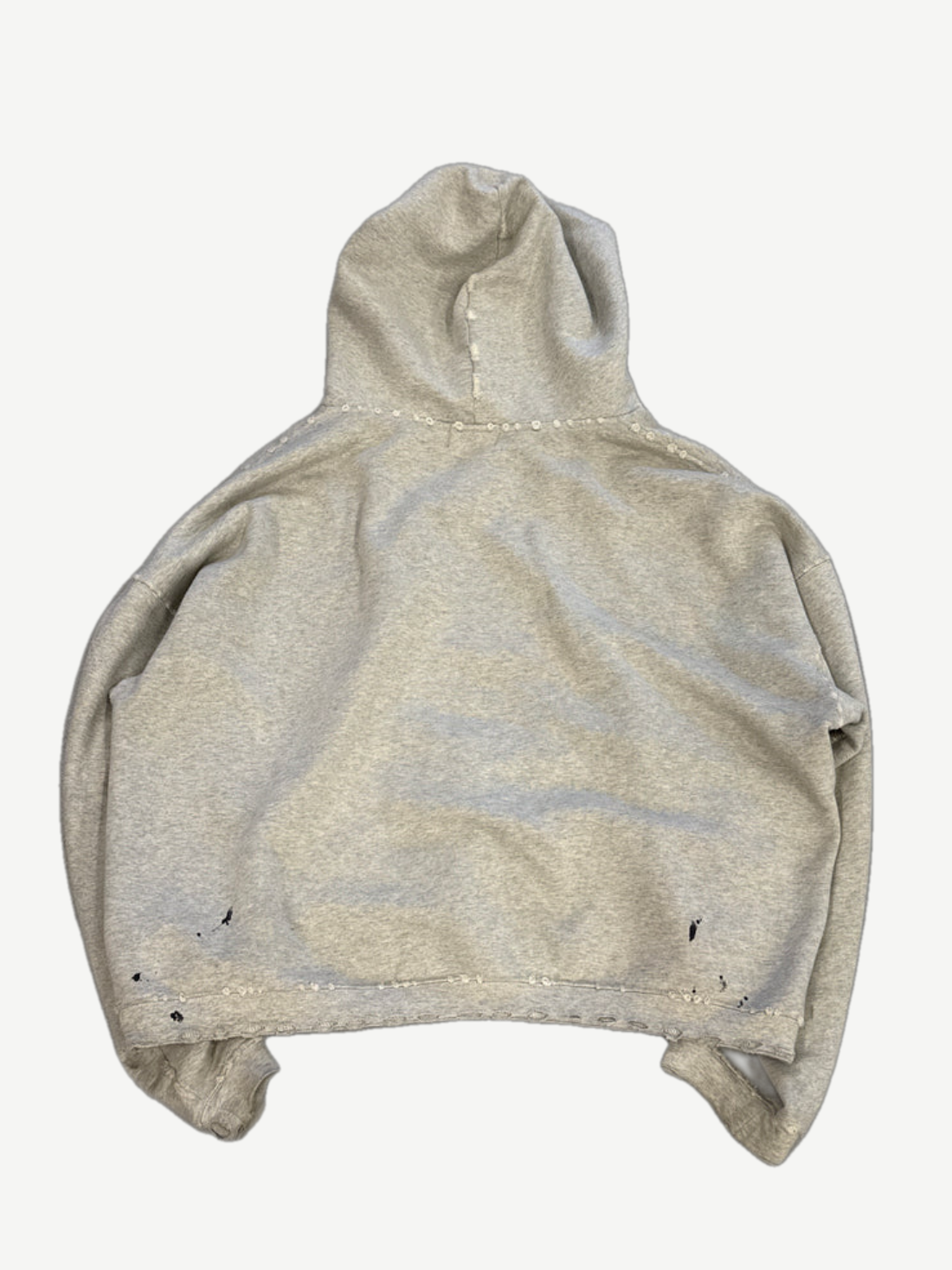 Enfants Riches Deprimes heather gray hoodie back view with allover distressing and worn raw edges.