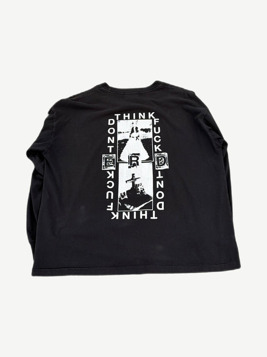Back view of Enfants Riches Deprimes Lips longsleeve in cream cotton with faint print bleed-through showing.