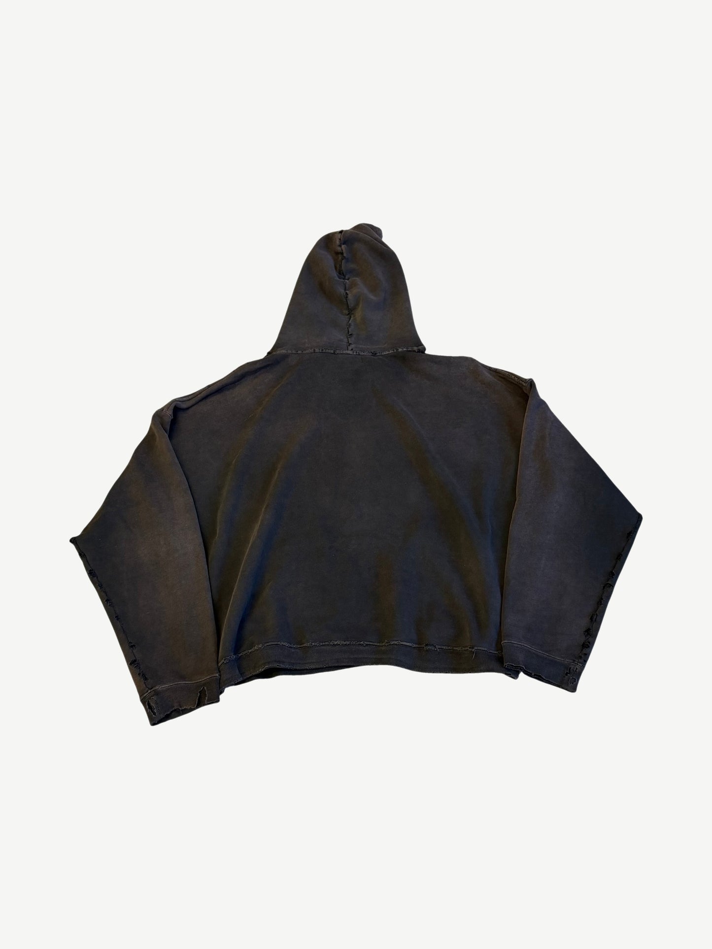 Back of Enfants Riches Deprimes faded black hoodie showing distressed seams and oversized boxy silhouette
