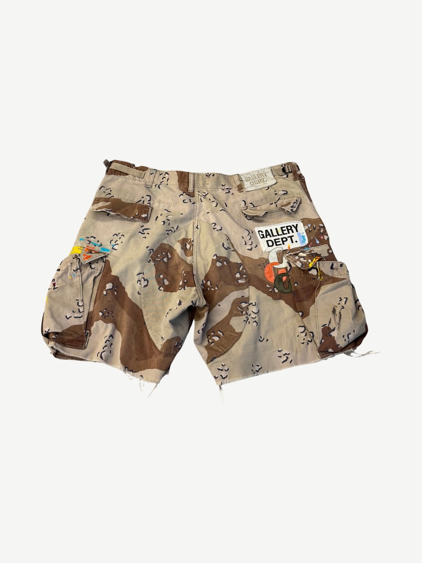 Gallery Dept chocolate chip camo cargo shorts back with white Gallery Dept patch and paint splatter