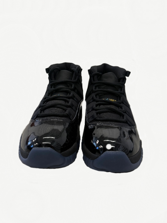 Jordan 11 Retro Gamma Blue sneaker pair top view with white midsole, black mesh and blue accent stitching.