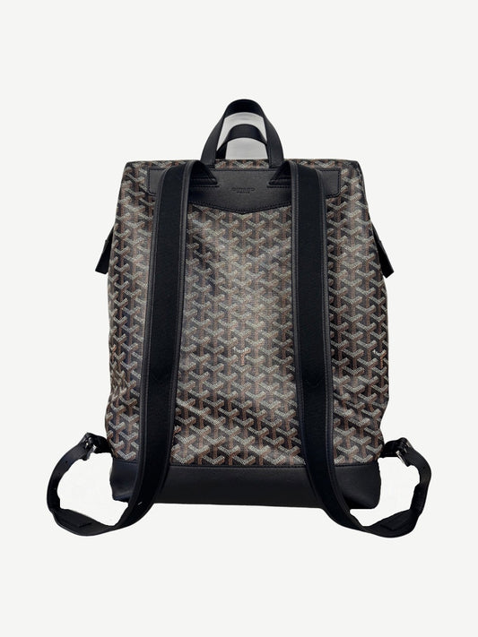 Goyard Cisalpin backpack rear view showing black leather adjustable shoulder straps over chevron canvas