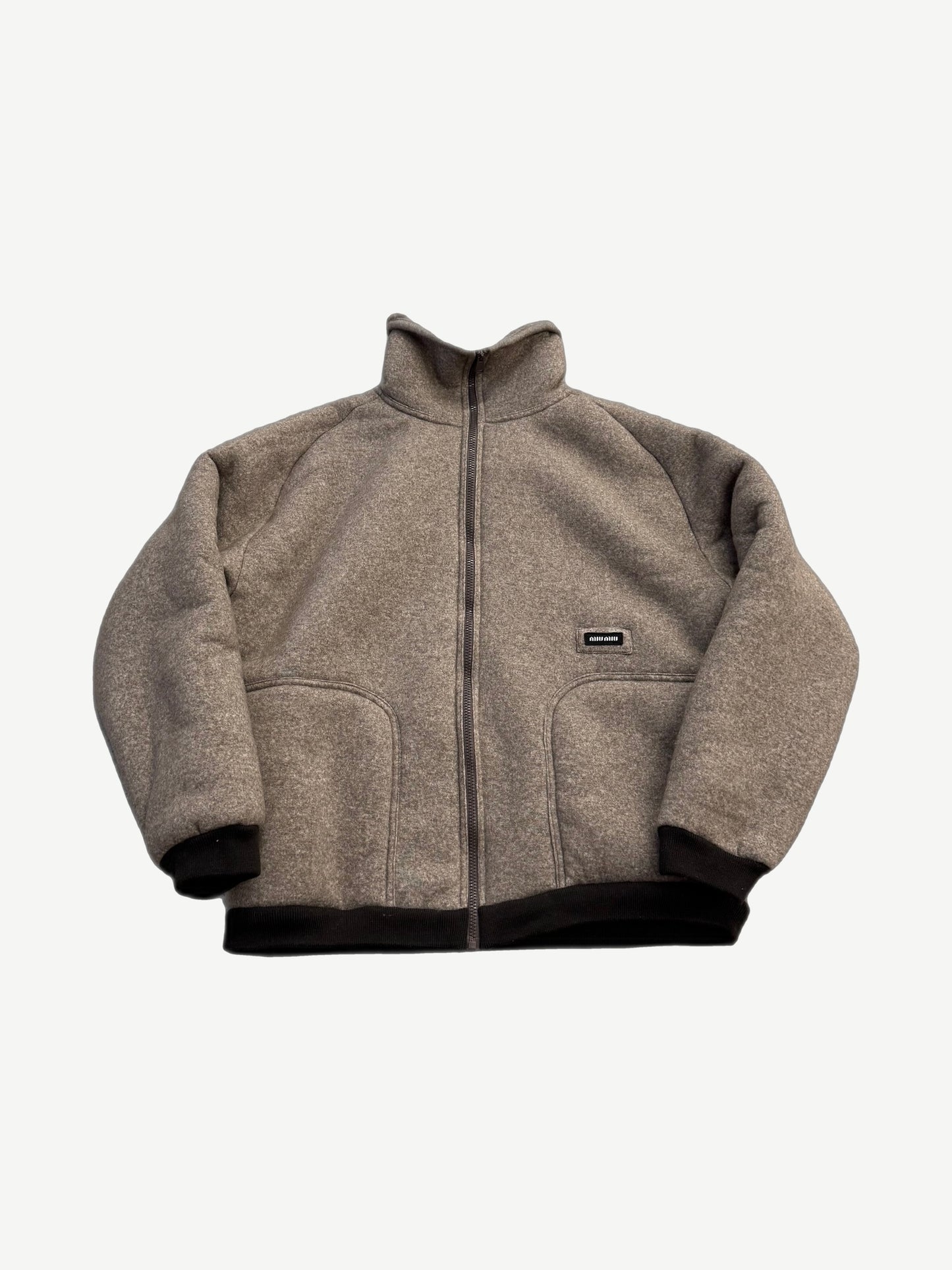 Miu Miu cotton fleece blouson jacket in soft grey with full zipper front, ribbed collar, cuffs and hem.