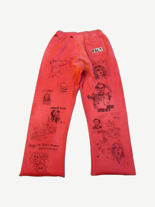 Back of Paly Hollywood Chelsea Hotel red sweatpants with sketch portraits, Paly patch and faded wash.