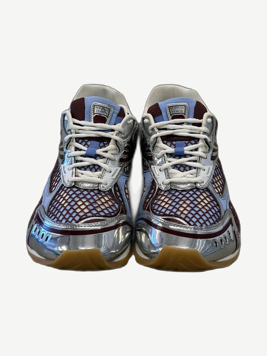 Bottega Veneta Orbit sneakers front view with blue tongue, white laces and silver chrome midsole detail.