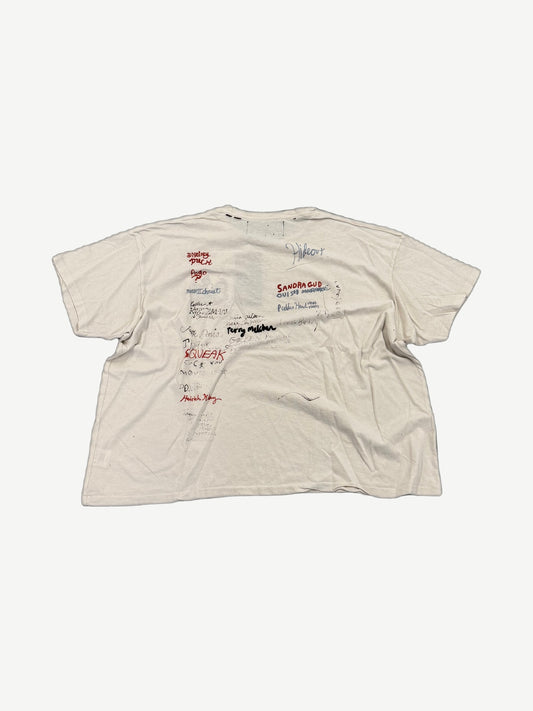 Paly Hollywood signature tee back view in white cotton with distressed holes and worn texture.