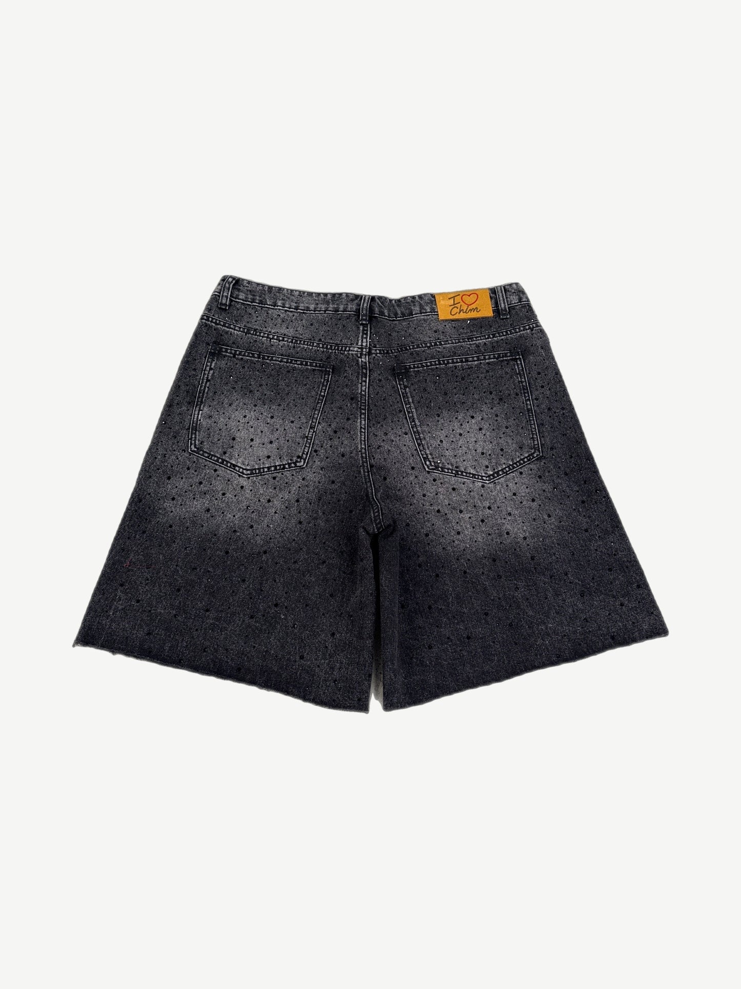 HMDD Billie Jean black jean shorts, back view showing rear pockets and stud detailing on dark denim