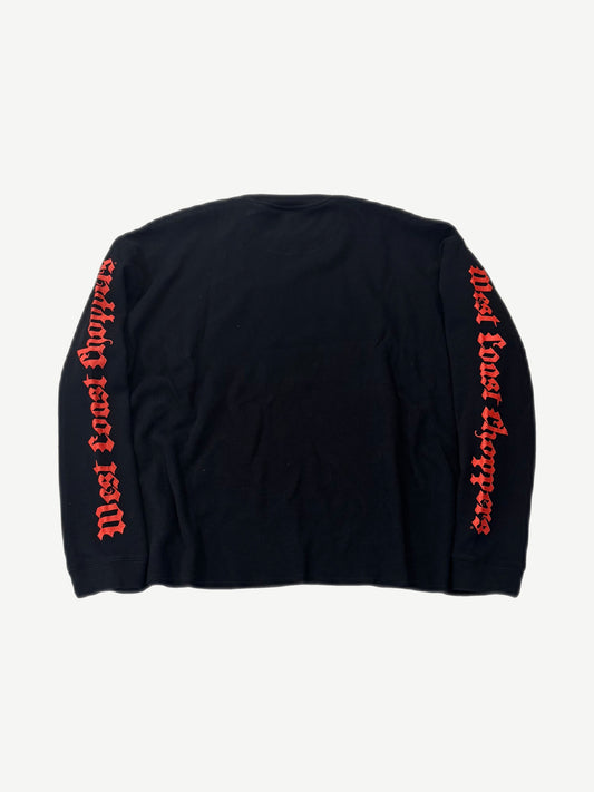 Back of West Coast Choppers black thermal with red gothic script running down both sleeves
