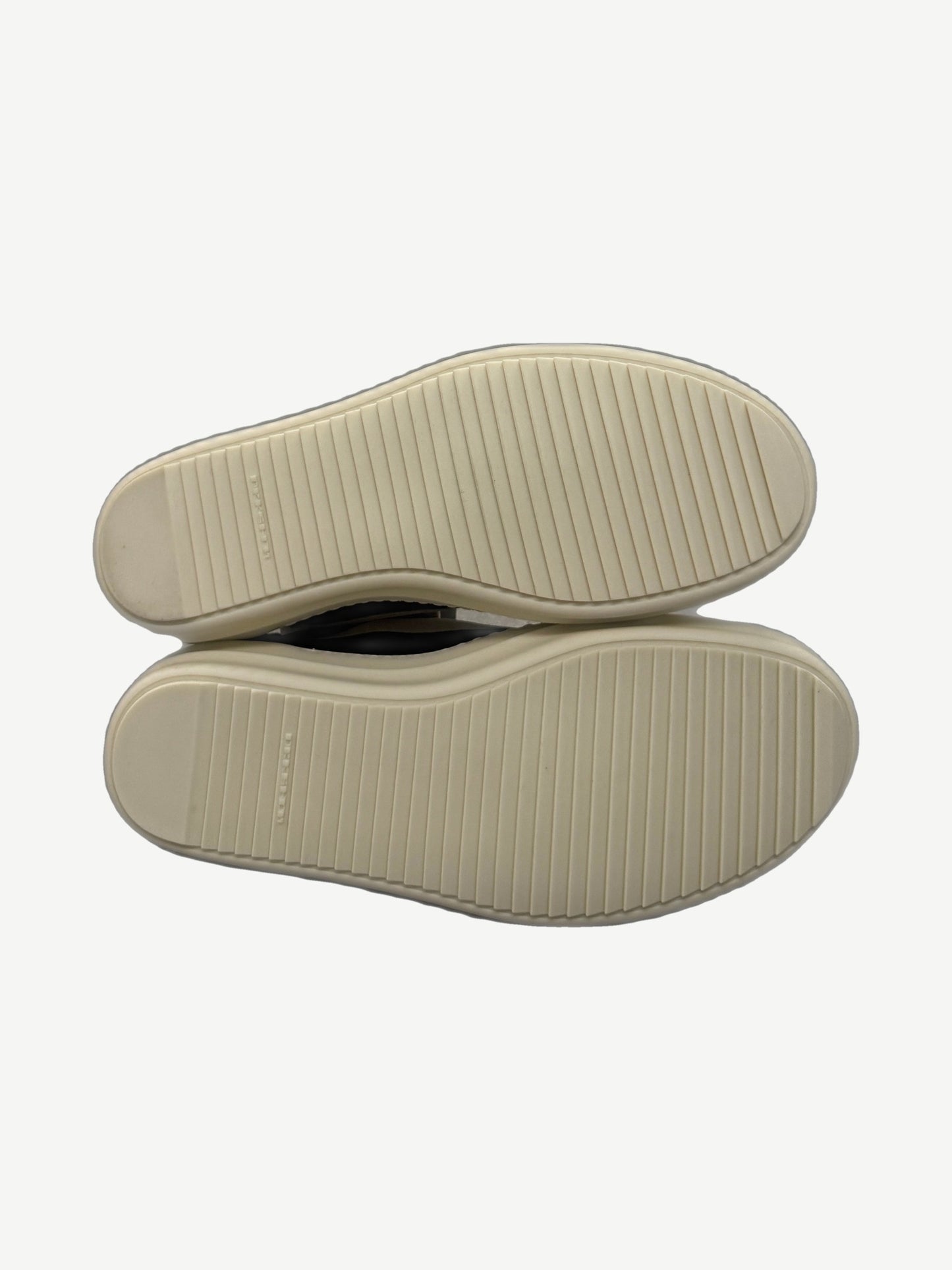 Rick Owens DRKSHDW black Vintage sneakers sole view showing ribbed cream rubber tread pattern and branded heel.
