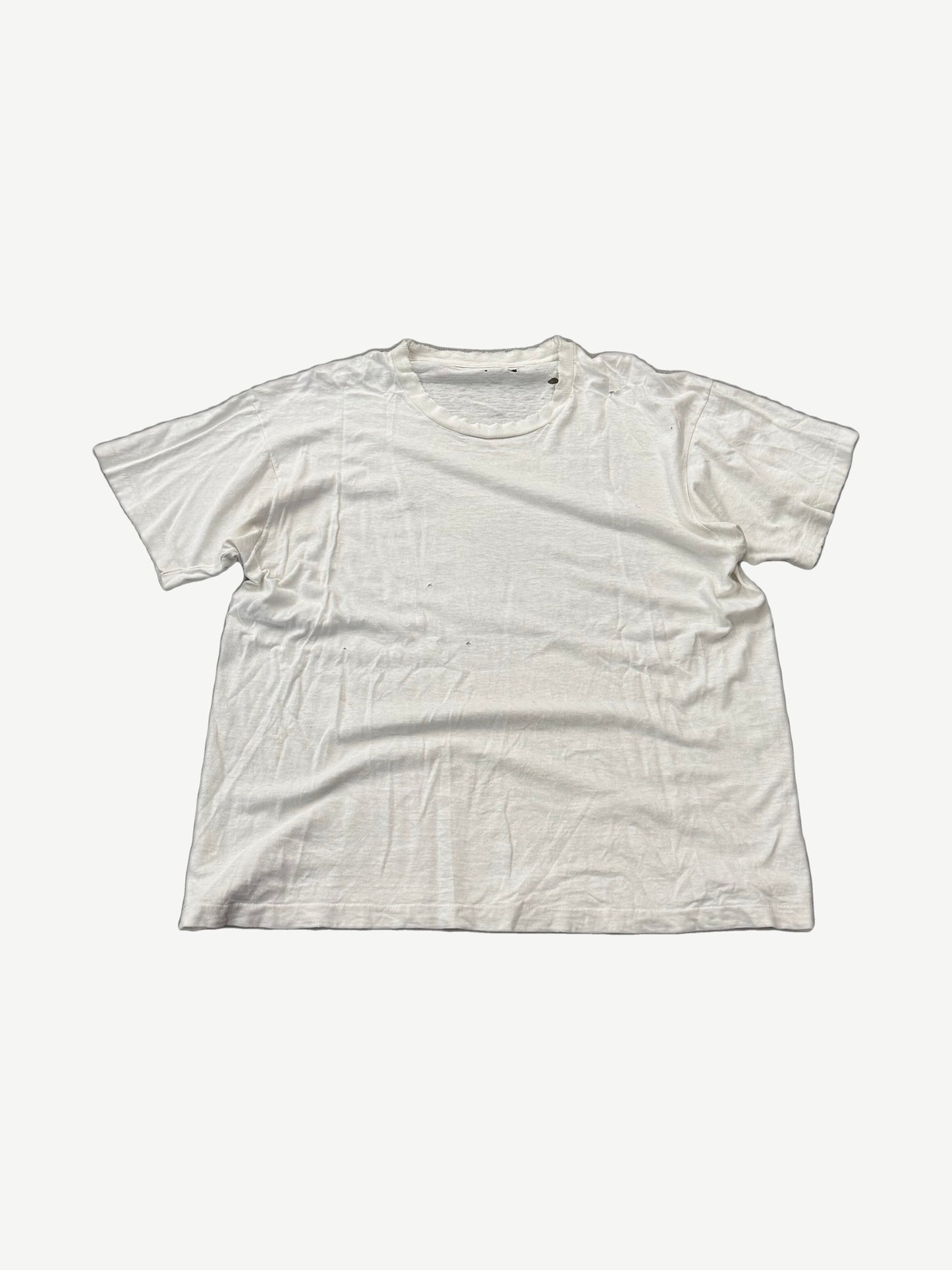 Vintage Marlboro Cowboy Adventure tee front, plain distressed white cotton with holes and natural aging.