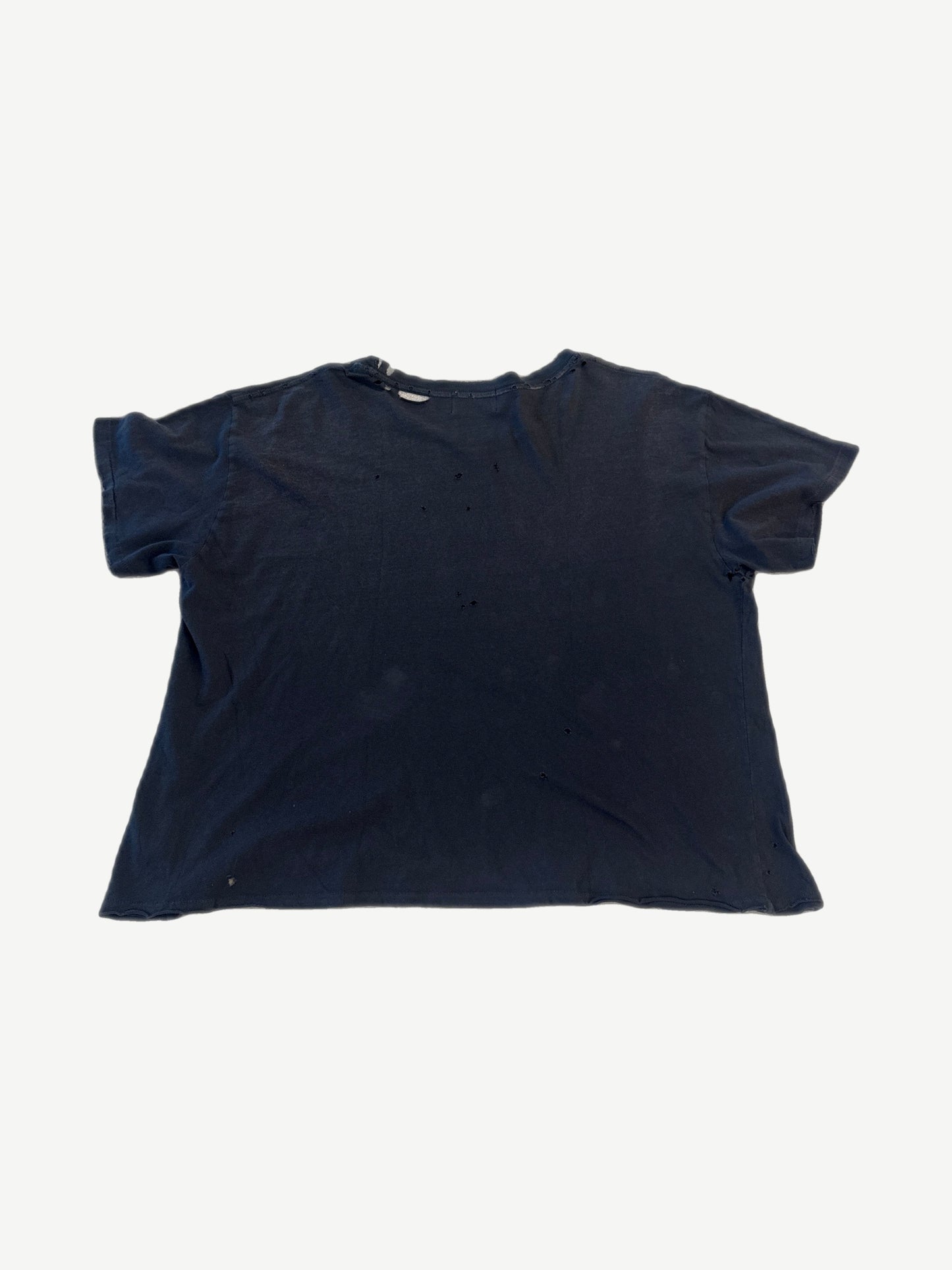 Enfants Riches Deprimes black distressed tee back view, plain panel with peppered holes and worn neckline.