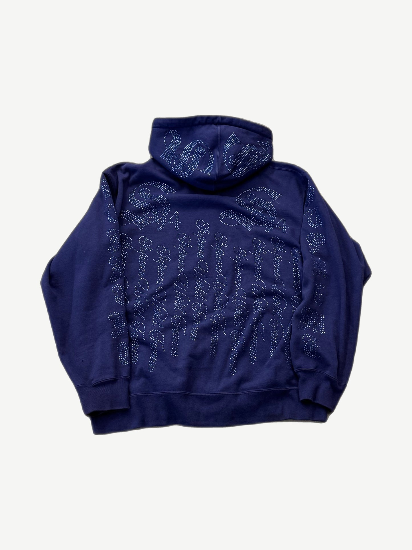 Supreme washed navy rhinestone zipup hoodie back view with repeating crystal script logo across body and hood