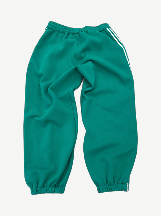 GV Gallery green scrunch sweatpants back view showing Raspberry Hills Lil Leon graphic and bunched hem.