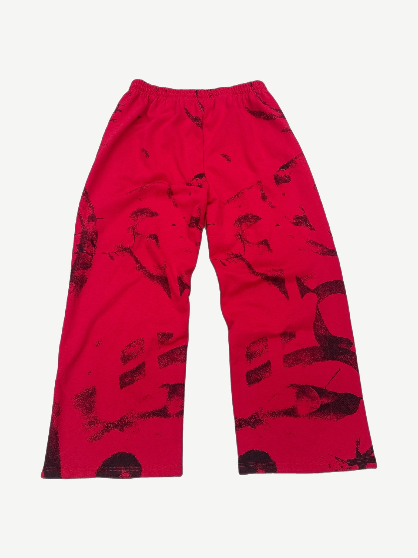 GV Gallery Raspberry Hills red graffiti sweatpants back view with allover dark scribbled print.