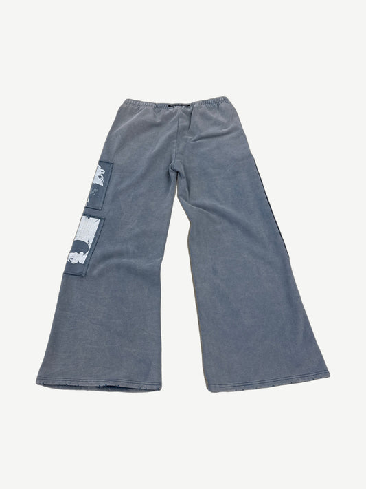 Matiere De Desires blue sweatpants back view showing relaxed tapered fit and clean fleece construction.