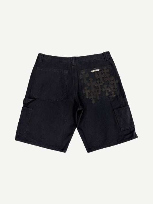 Chrome Hearts black carpenter shorts back view flooded with black leather cross patches on right pocket and panel