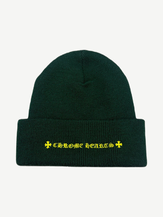 Chrome Hearts forest green beanie reverse side with yellow gothic Chrome Hearts text and cross emblems on cuff
