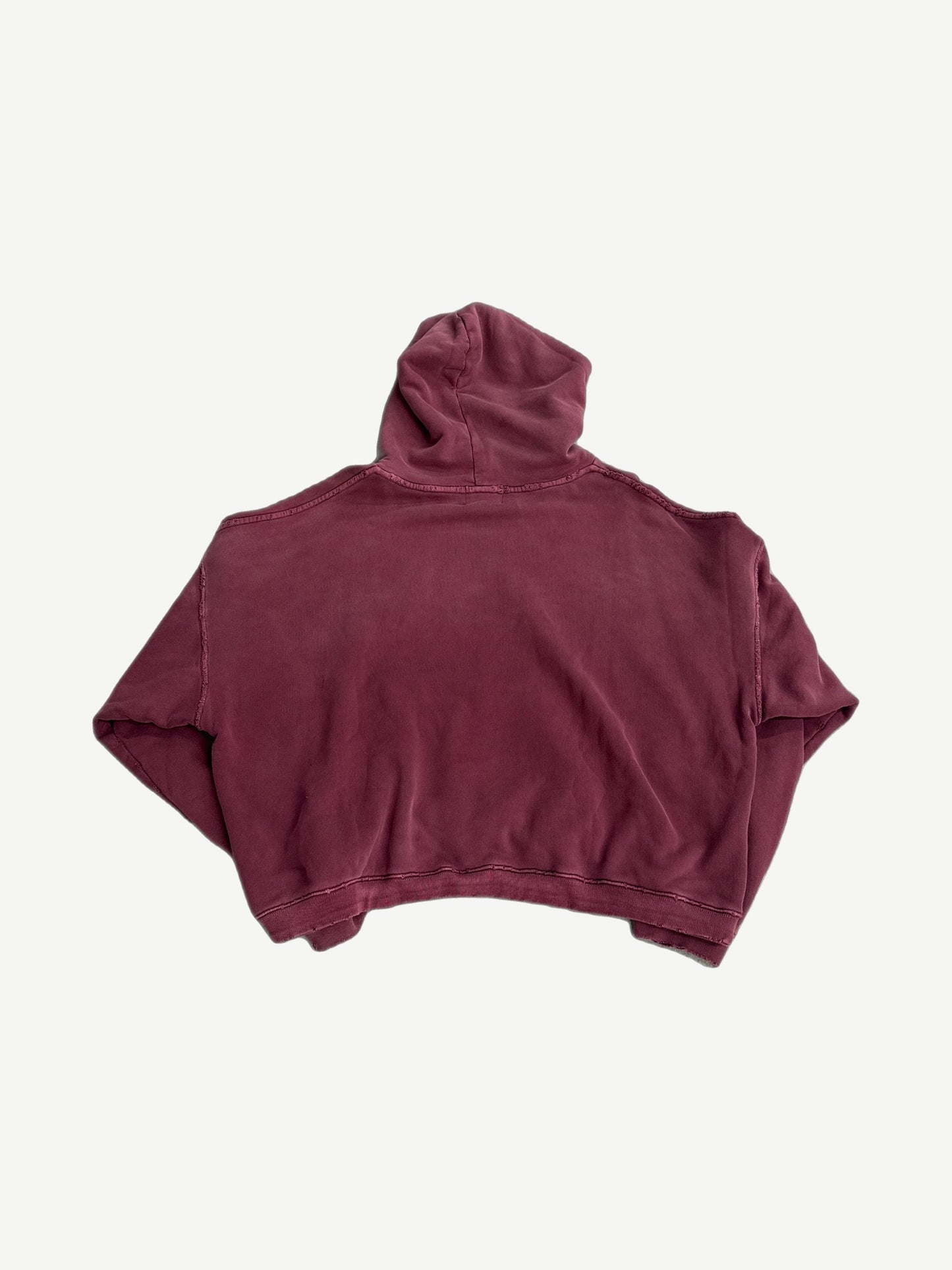 ERD washed burgundy distressed hoodie back view, faded oxblood cotton fleece with shredded hem and holes.