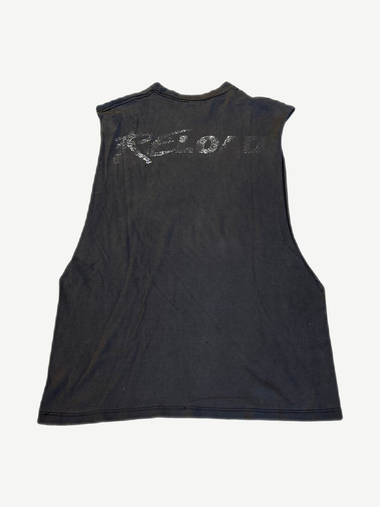 Vintage Metallica Reload cutoff tee back view with faded Reload tour print on aged black cotton.