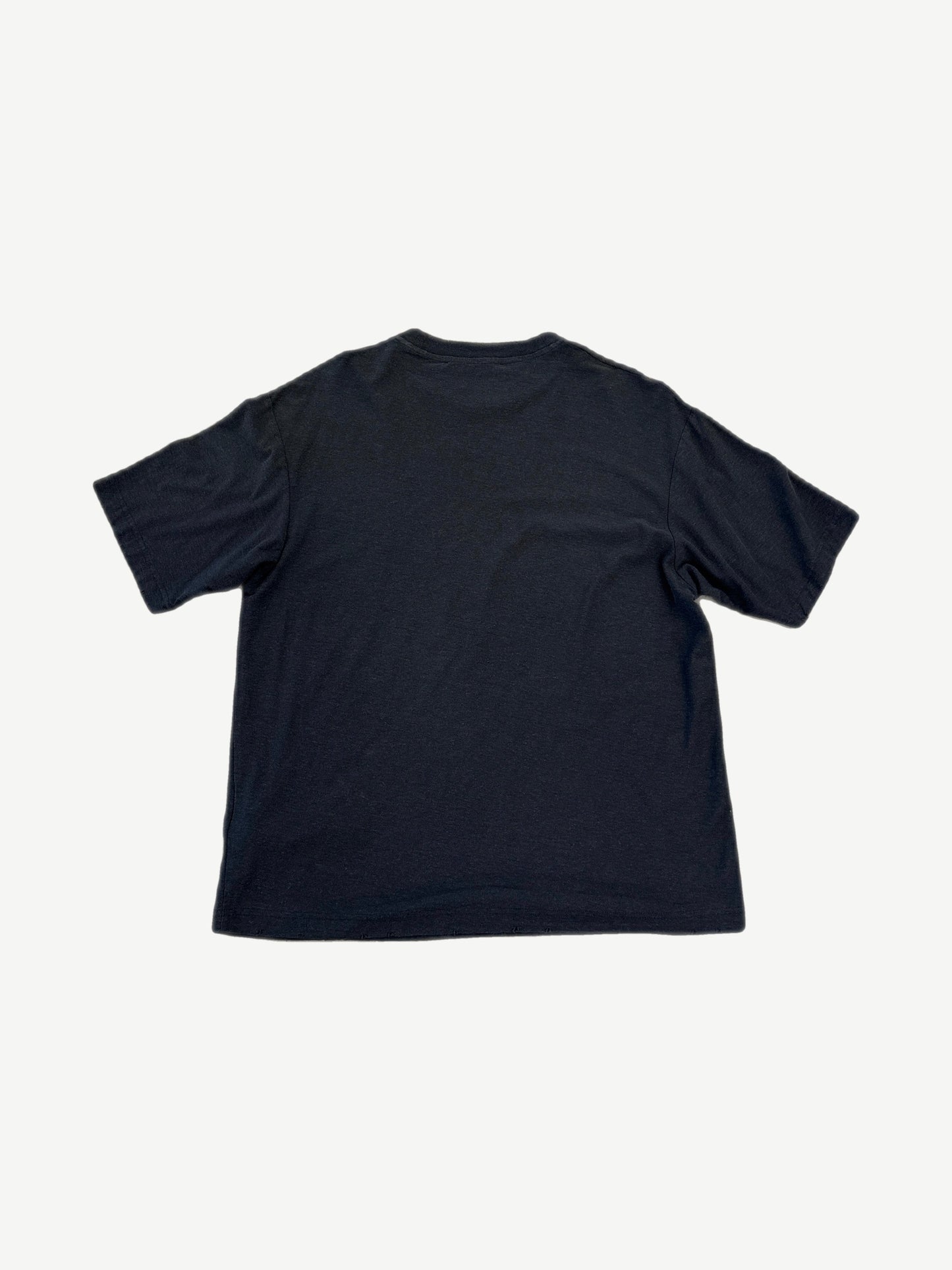 Back view of Acne Studios plain black short sleeve t-shirt with relaxed boxy fit and no rear graphics.