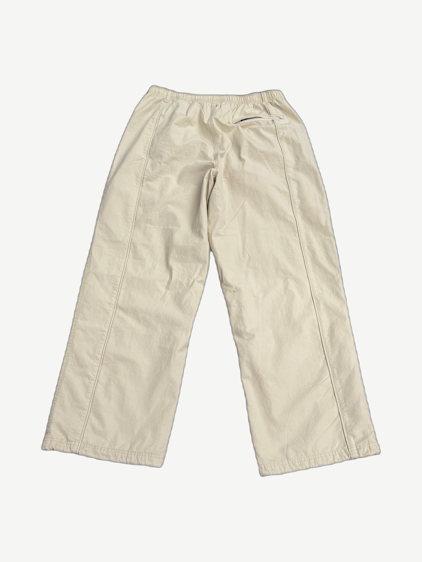 Supreme x Umbro stone ripstop track pants back, wide-leg silhouette with embroidered Umbro diamond logo.