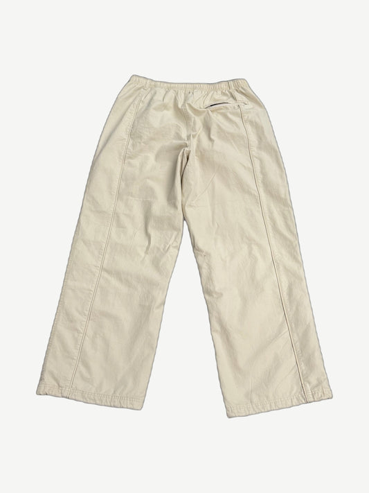 Supreme x Umbro stone ripstop track pants back, wide-leg silhouette with embroidered Umbro diamond logo.