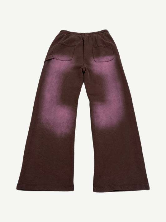 Back of HMDD brown sweatpants showing faded purple sun-bleached fade across seat and rear pockets.