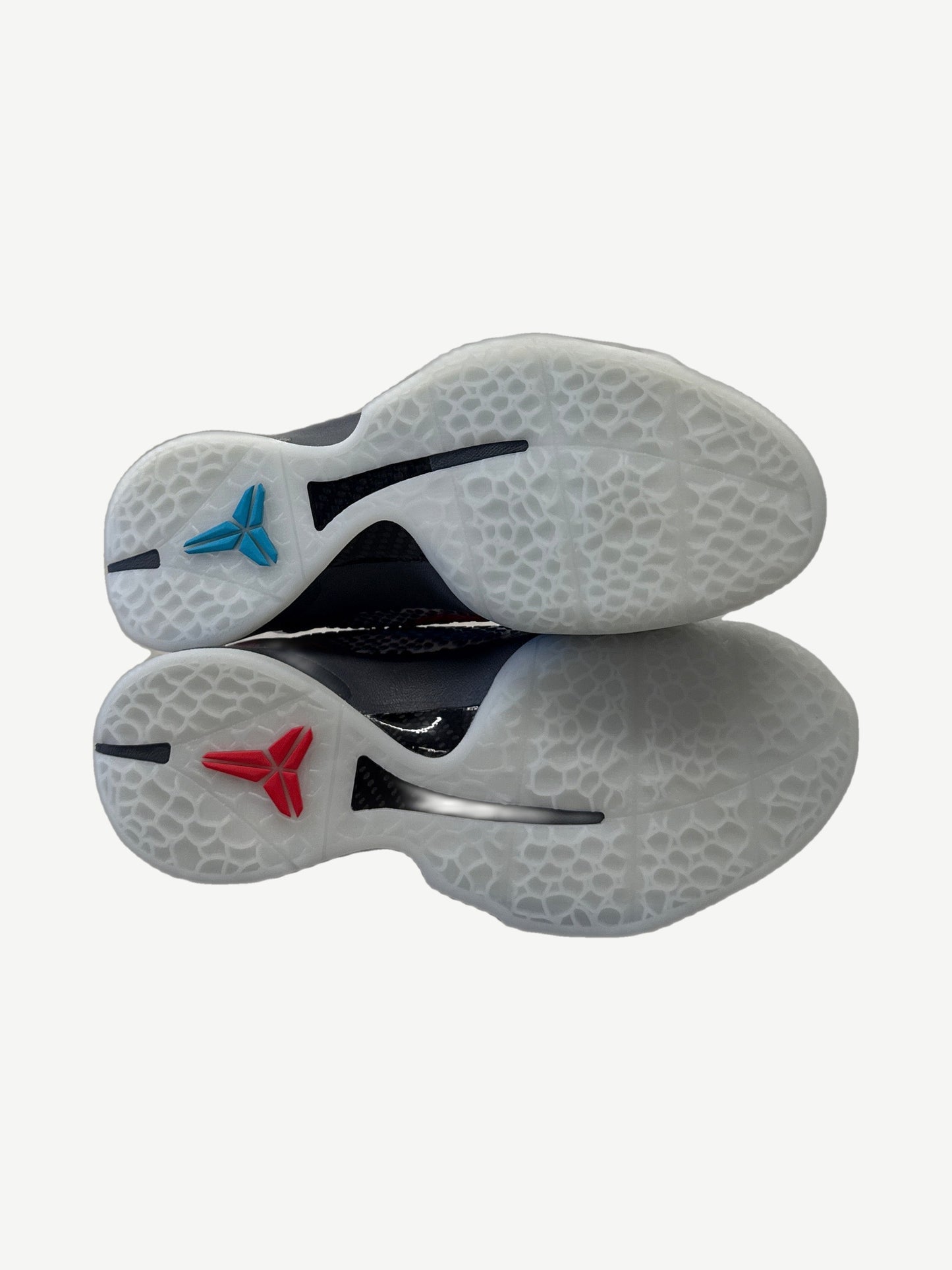Nike Kobe 6 Protro ASG outsole view, translucent rubber with red and blue Kobe sheath logos on each forefoot.