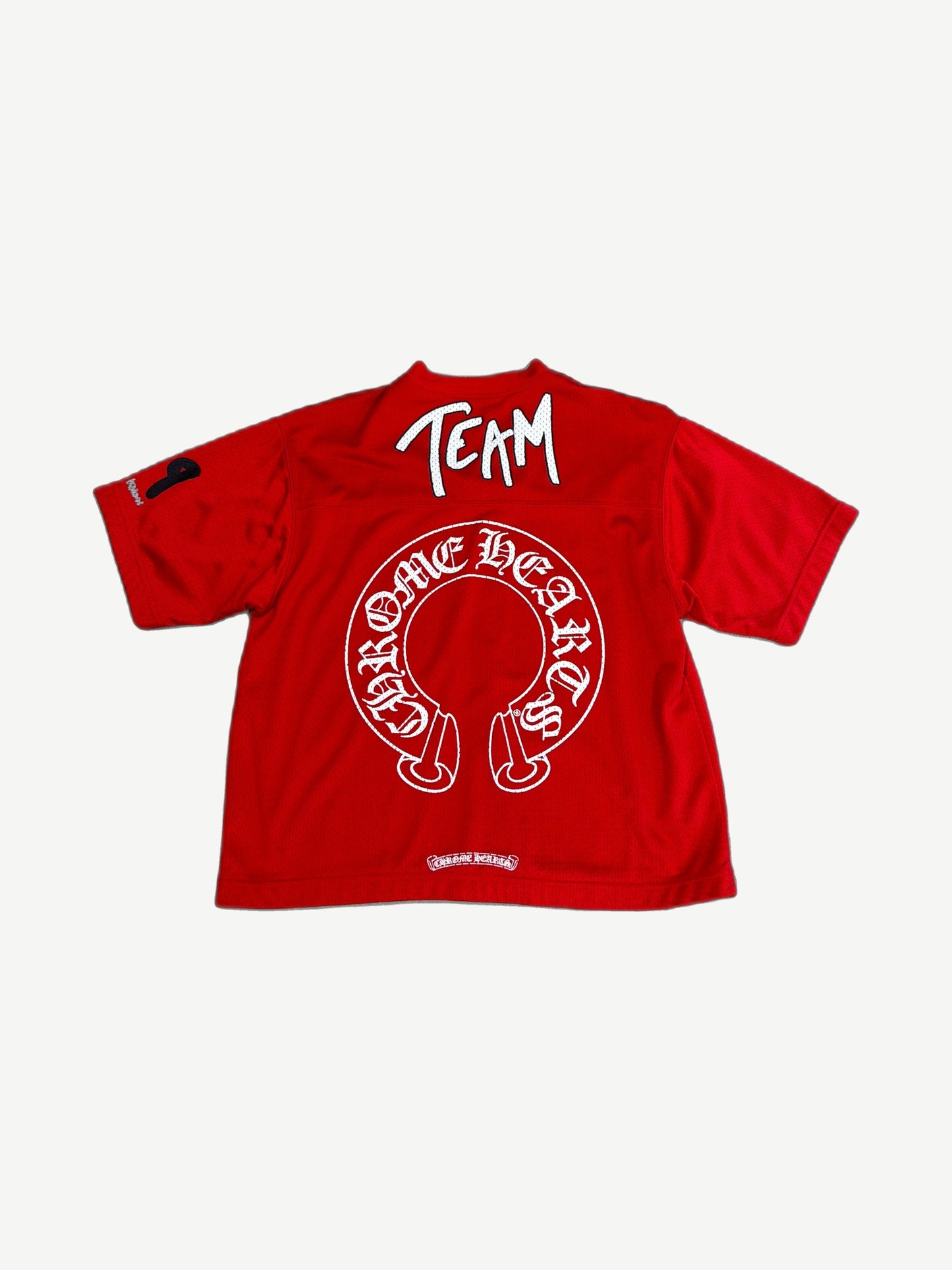 Chrome Hearts red mesh jersey back with white TEAM script and large horseshoe logo applique print