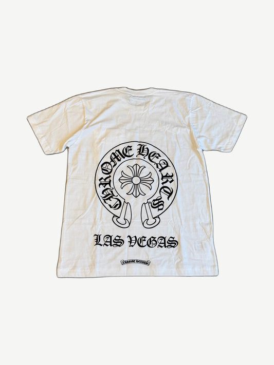 Chrome Hearts white Las Vegas tee back with large gothic horseshoe cross and Las Vegas print