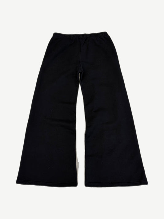 Bottega Desires black wide-leg sweatpants rear view with elastic waistband and flared cotton fleece silhouette