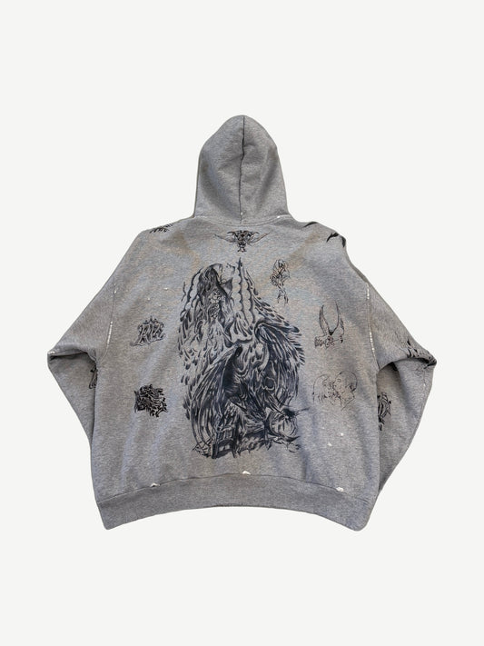 Back of Balenciaga gray tattoo hoodie showing large central angel print and scattered tattoo-style graphics