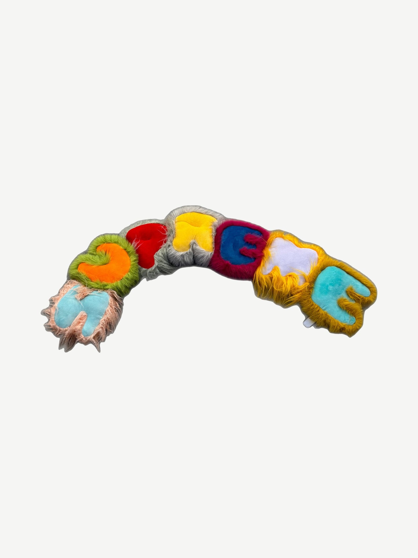 Supreme faux fur pillow in vibrant multicolor shag with bold rainbow stripes and signature box logo accent