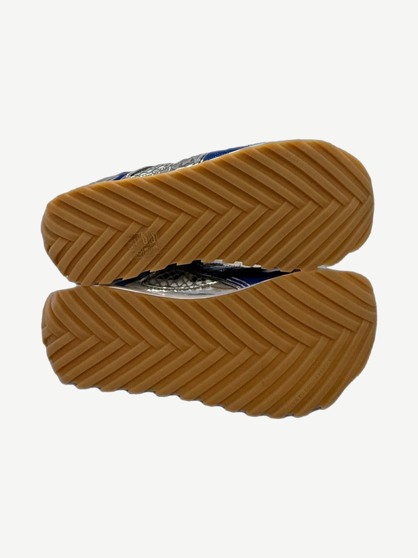 Bottega Veneta Orbit sneakers sole view showing gum rubber outsole with intrecciato woven tread pattern