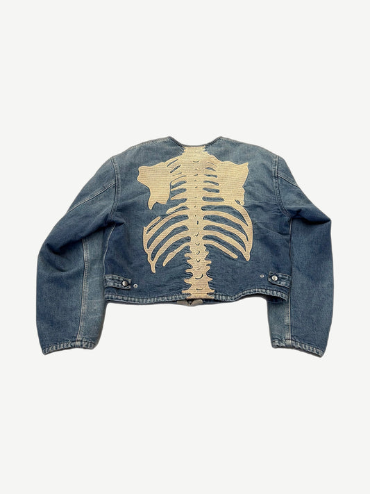 Kapital skeleton denim jacket, back view of full spine and ribs embroidery on faded indigo denim